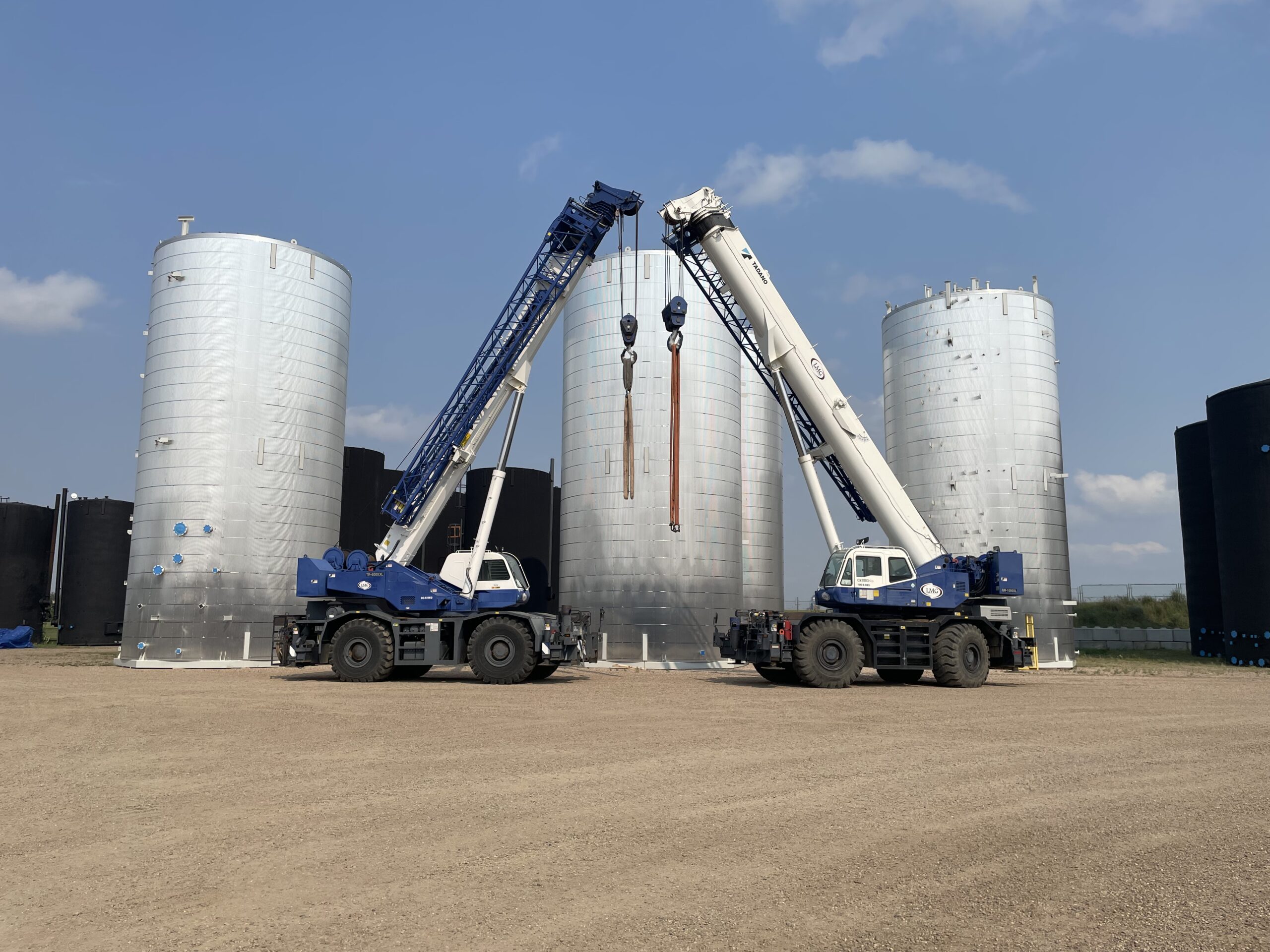 Showcasing our Vermilion Facility's Crane Capabilities with Overhead and Yard Cranes Handling Large-Scale Steel Storage Tanks