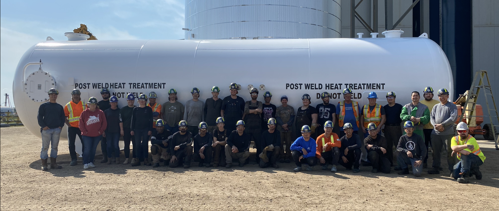 Vermilion Team Standing Proudly in Front of a Pressure Vessel, Exemplifying Trust and Expertise in Pressure Vessel Solutions